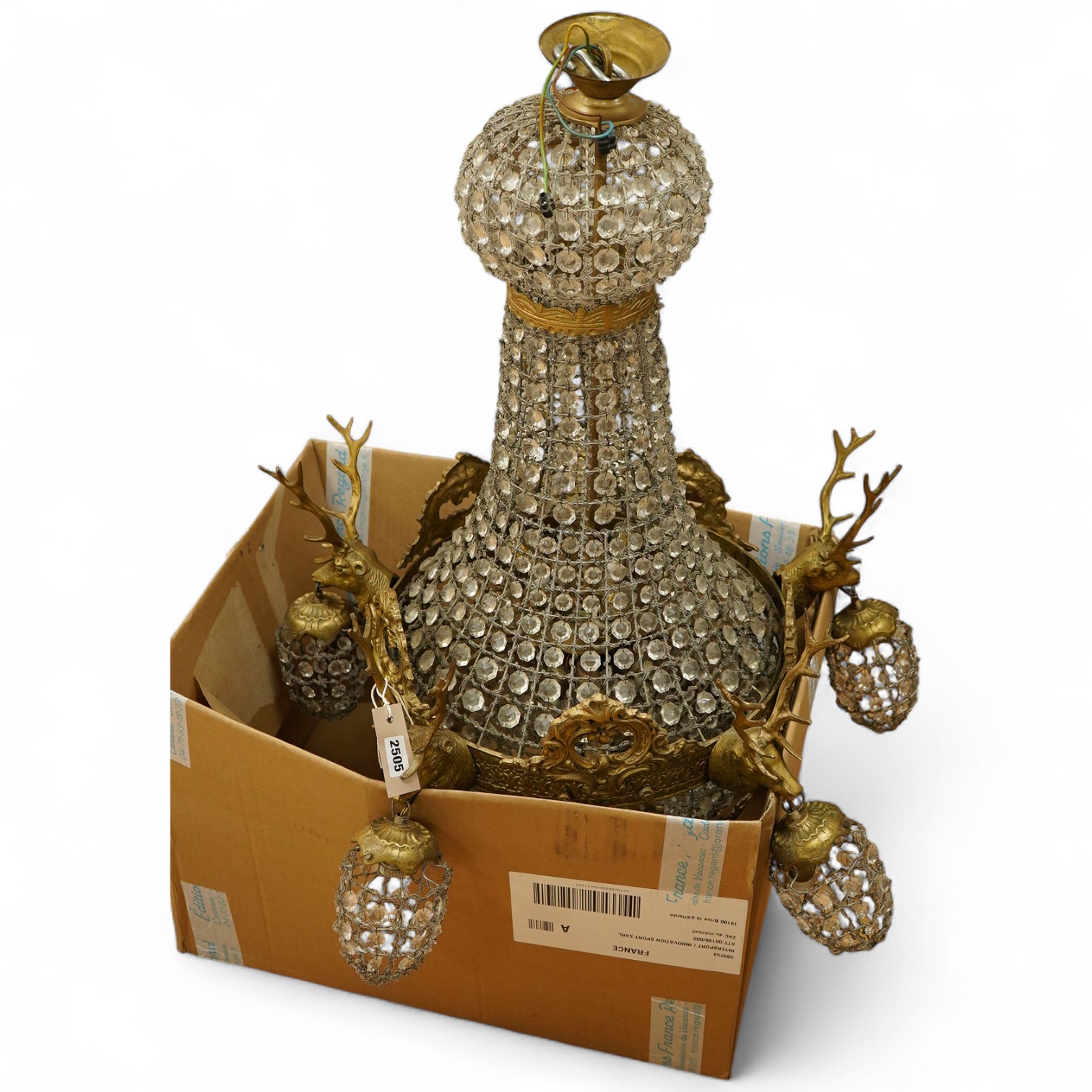A large five light basket chandelier mounted with gilt metal stags heads, 90cm high